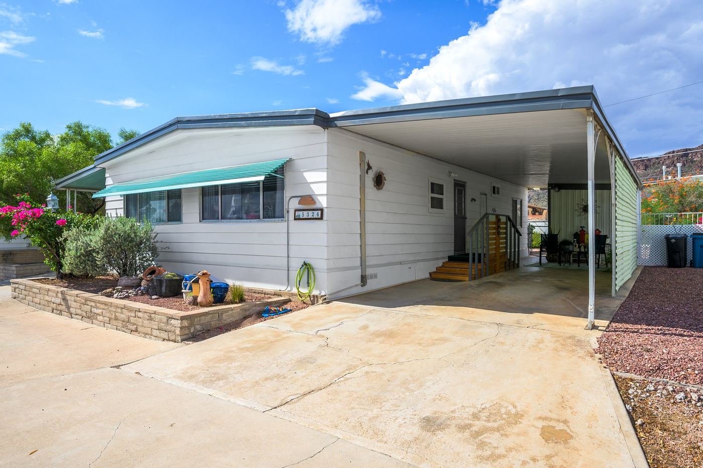 Front of the home and carport at 5324 W Flying W Street